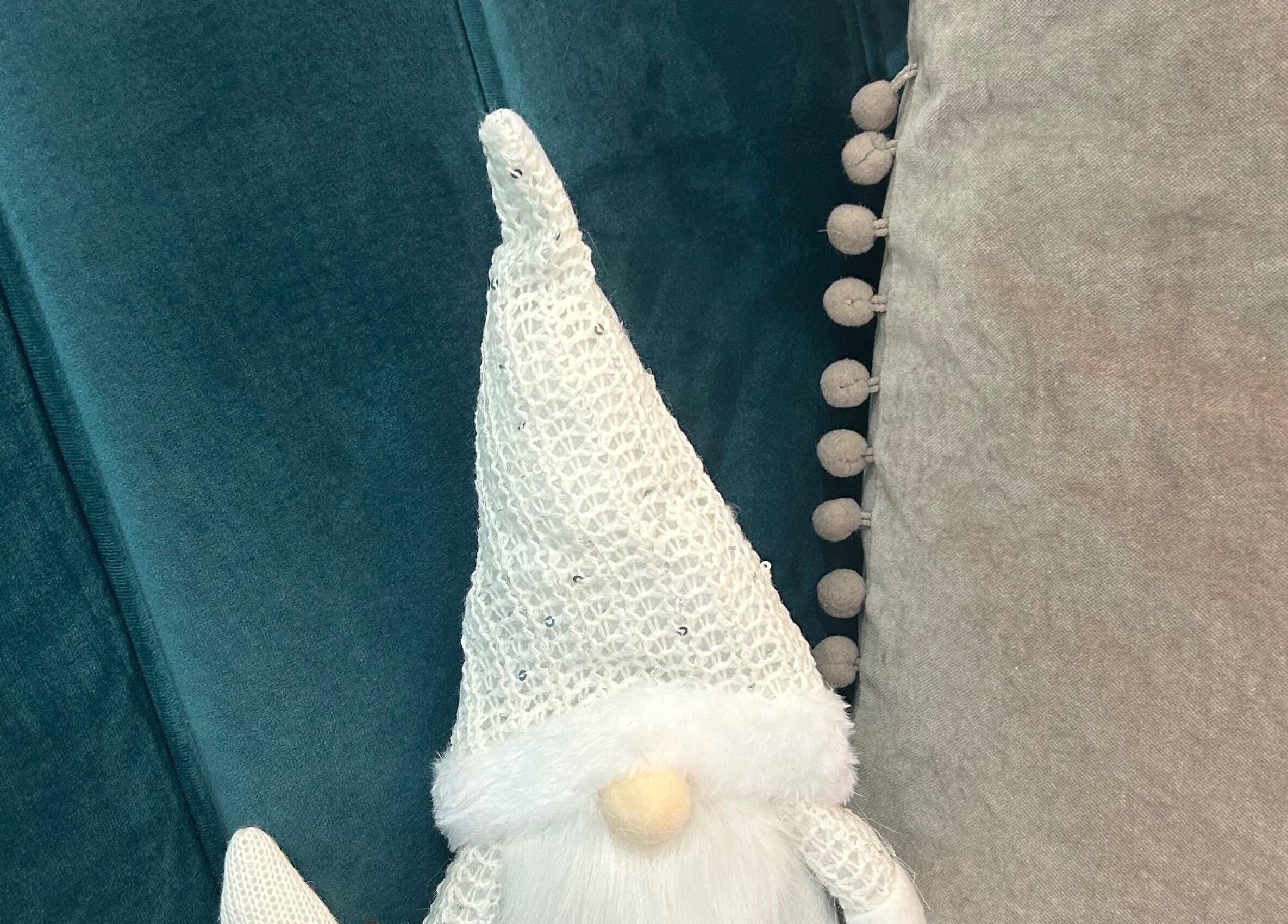 Gnome decor in teal setting at Be Beautiful by Alex, Glenfield, England, GB.