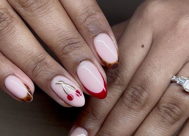 Elegant nail art with cherry accents at The Cove - New Plymouth, New Plymouth, Taranaki, NZ.