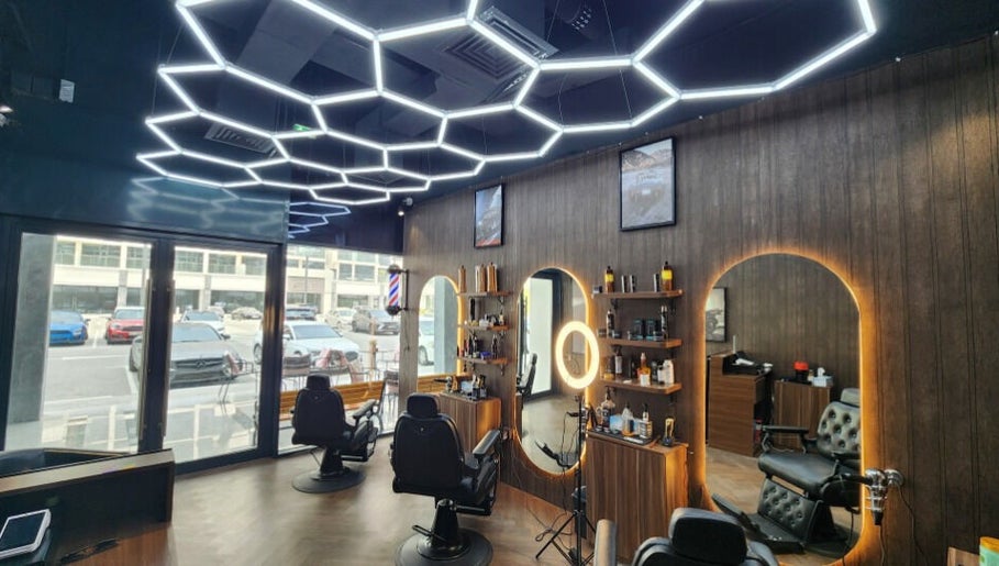 Stylish interior of The Barber House - Azizi Riviera in Dubai, Dubai, AE with modern lighting and sleek decor.
