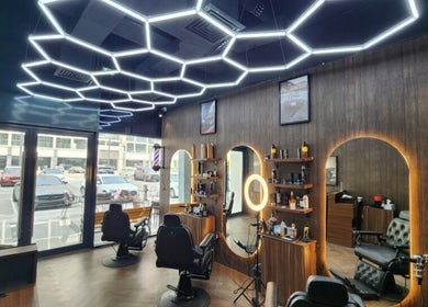 Stylish interior of The Barber House - Azizi Riviera in Dubai, Dubai, AE with modern lighting and sleek decor.