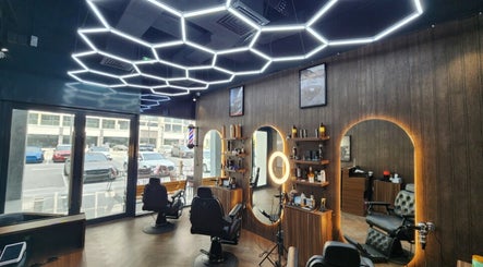 Stylish interior of The Barber House - Azizi Riviera in Dubai, Dubai, AE with modern lighting and sleek decor.