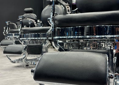 Luxurious barber chairs at The Barber House - JLT, Dubai, Dubai, AE, highlighting premium grooming experience.
