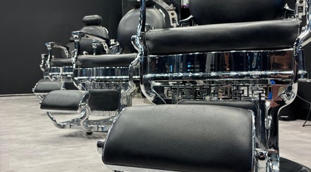 Luxurious barber chairs at The Barber House - JLT, Dubai, Dubai, AE, highlighting premium grooming experience.
