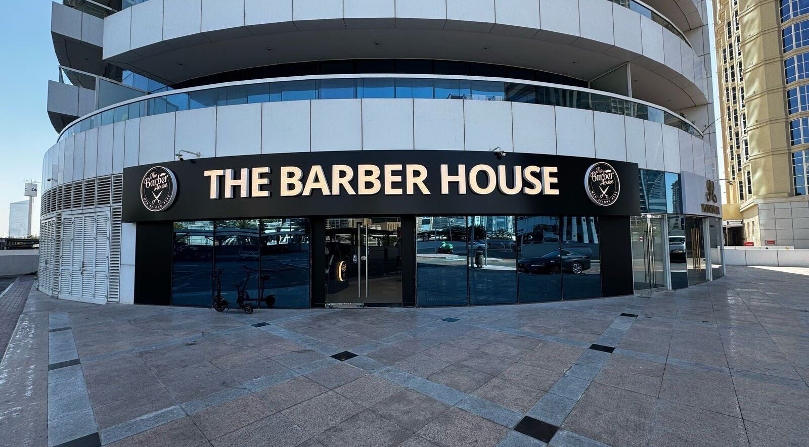 The Barber House - JLT entrance in Dubai, Dubai, AE, featuring modern architecture and welcoming facade.