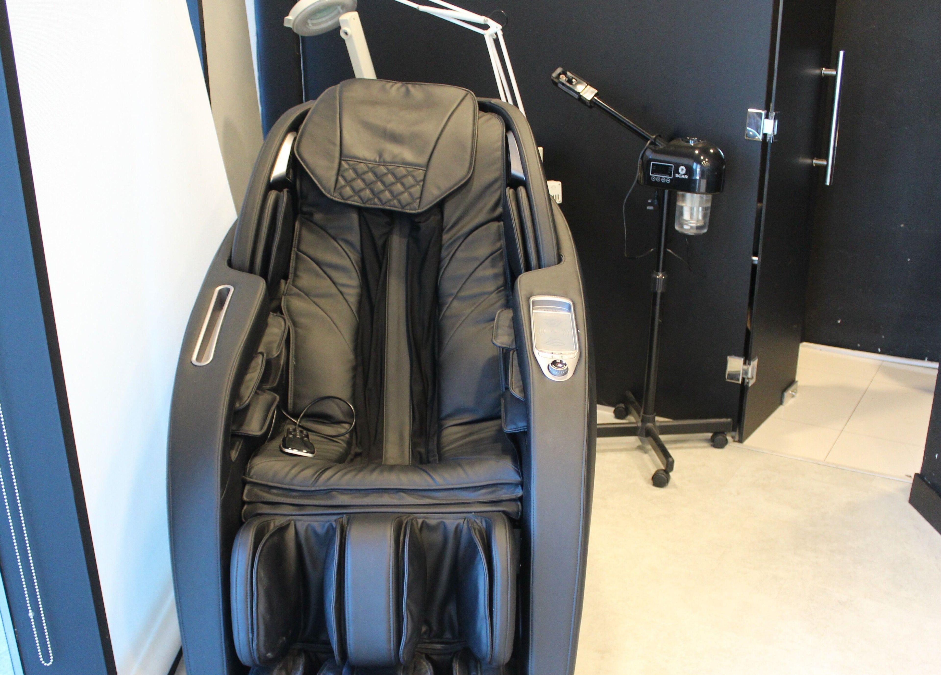 Luxury massage chair at The Barber House - JLT, Dubai, Dubai, AE, offering ultimate relaxation.