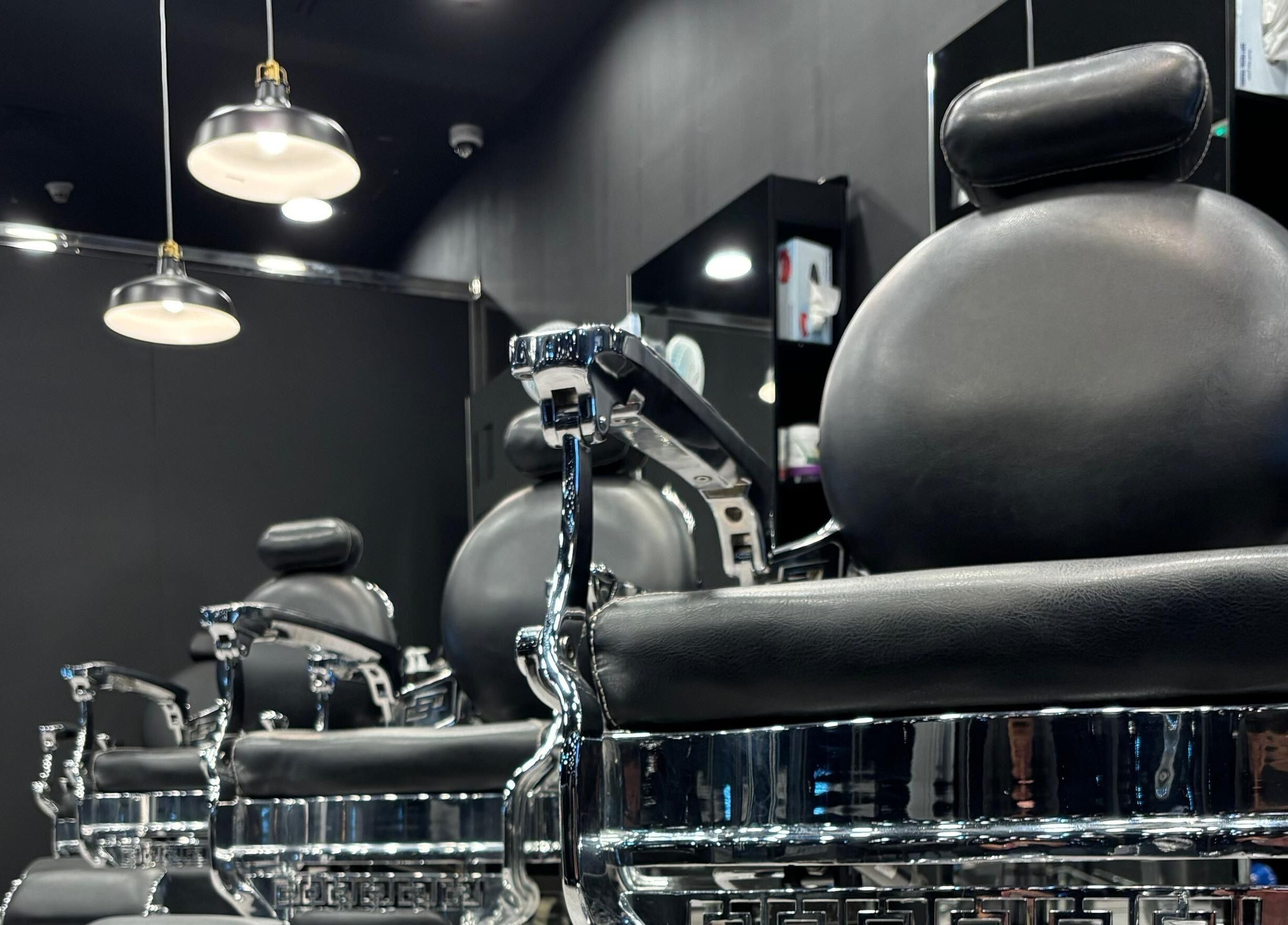 Luxurious barber chairs at The Barber House - JLT in Dubai, Dubai, AE, offering a premium grooming experience.