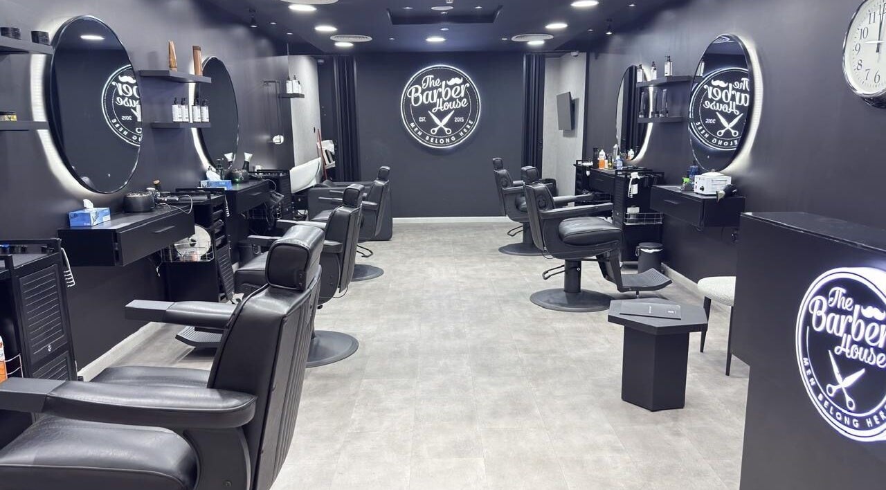 Inside The Barber House - Dubai Marina, sleek chairs and modern design at Dubai, Dubai, AE.