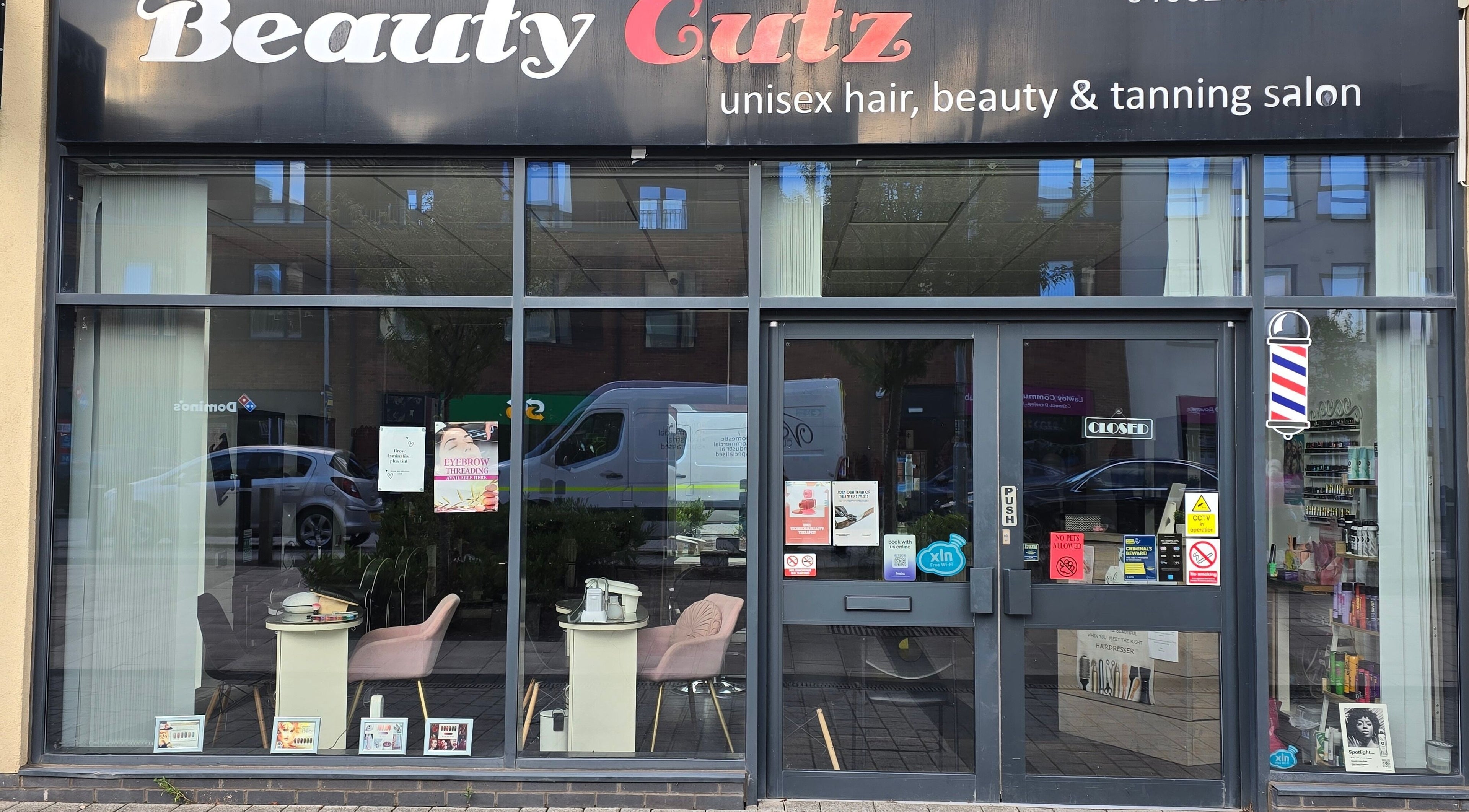 Front view of Beauty Cutz, a stylish salon in Telford, England, GB, showcasing its inviting and modern design.