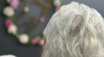 Close-up of styled silver hair at Beauty Cutz, Telford, England, GB.