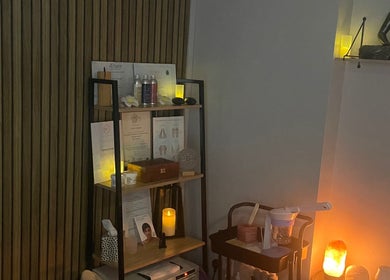 Cozy therapeutic corner at In-Touch Therapies by Frances, Pontypool, Wales, GB with calming lighting.