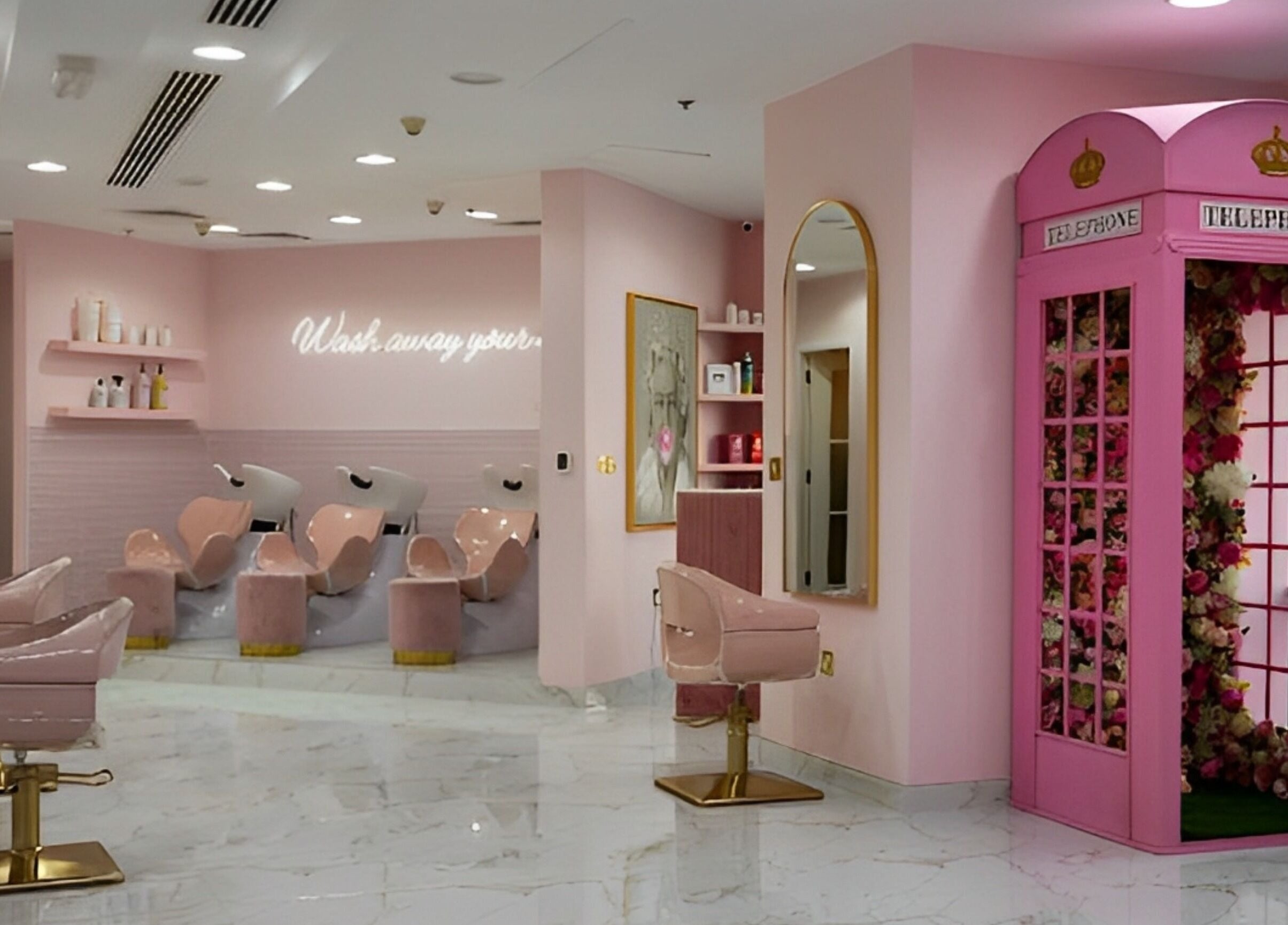 Elegant interior of The British Salon JLT, Dubai, Dubai, AE featuring pink decor and floral accents.