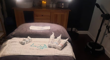 Tranquil treatment room at Renew Beauty Studio, Bangor, Northern Ireland, GB, with skincare products displayed.