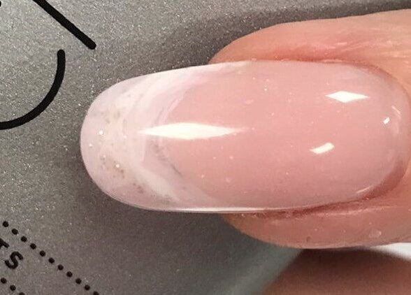 Close-up of polished nail showcasing elegant manicure at Rinn Neimhe Ballinamore, Ballinamore, County Leitrim, IE.