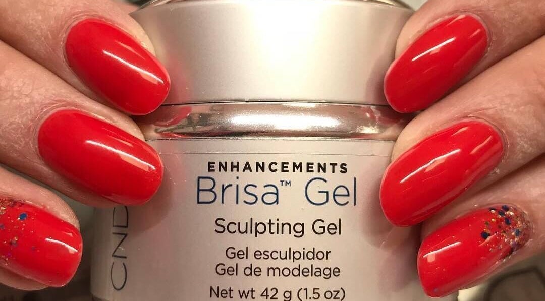 Bright red sculpted gel nails at Rinn Neimhe Ballinamore, Ballinamore, County Leitrim, IE.