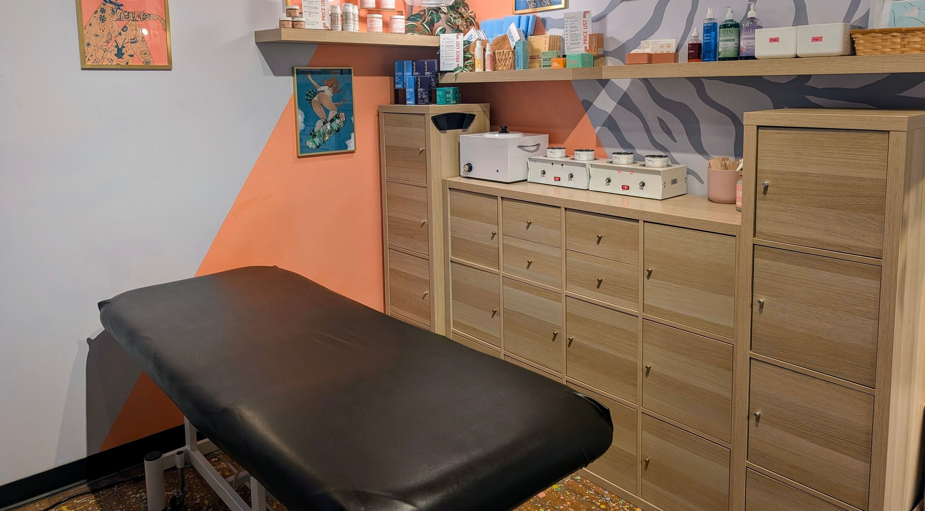 Massage table in cozy treatment room at The Body Politik, Vancouver, British Columbia, CA.