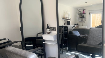 Modern salon interior at The Studio by Lois, Shefford, England, GB, showcasing sleek design and comfort.