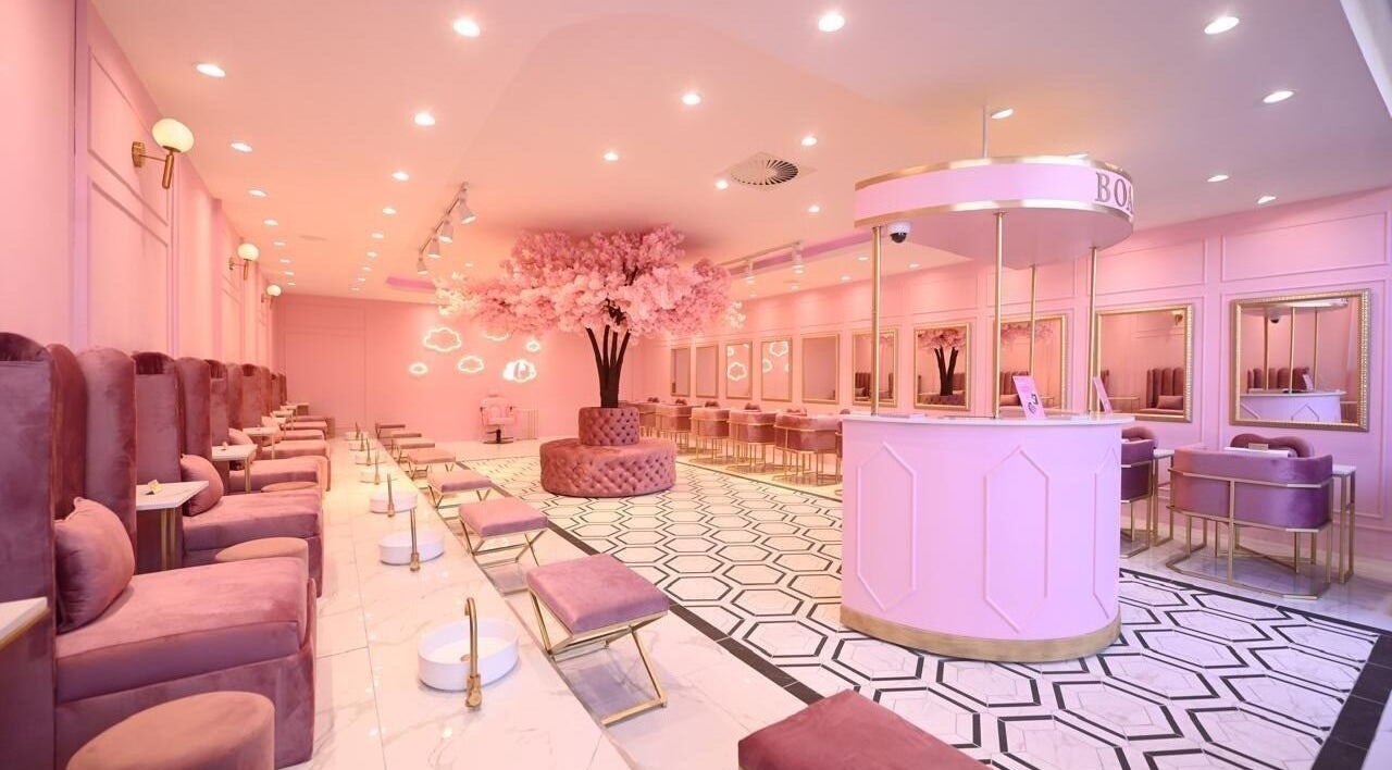 Luxurious pink interior of BOA Beauty Bar Kuils River in Cape Town, Western Cape, ZA with chic seating and decor.
