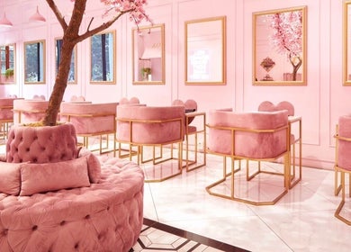 Luxurious pink interior at Boa Beauty Bar - Bree Street, Cape Town, Western Cape, ZA with plush seating and decor.