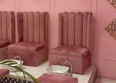 Elegant pink velvet seating at Boa Beauty Bar - Bree Street, Cape Town, Western Cape, ZA. Perfect for relaxation.