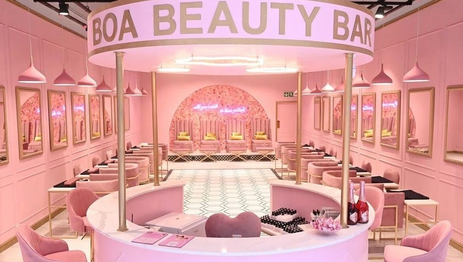 Elegant interior of BOA Beauty Bar - Mall Of The South, Alberton, Gauteng, ZA with pink decor and stylish seating.