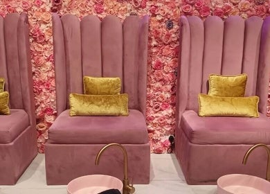 Elegant pink seats at BOA Beauty Bar - Mall Of The South, Alberton, Gauteng, ZA, offering luxurious relaxation.