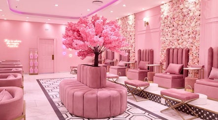 Luxurious pink seating area at BOA Beauty Bar Durbanville, Cape Town, Western Cape, ZA with floral decor.