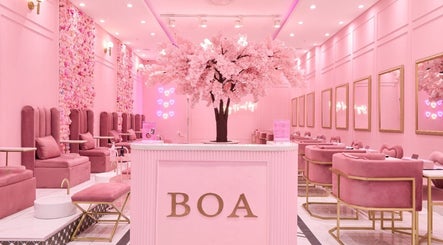 Elegant interior of BOA Beauty Bar Riverlands Mall in Cape Town, Western Cape, ZA with plush pink decor.