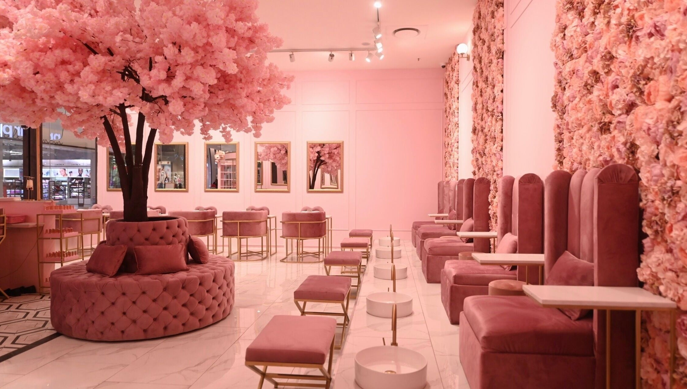 Luxurious pink seating area at BOA Beauty Bar Fourways Mall, Sandton, Gauteng, ZA with floral decor.