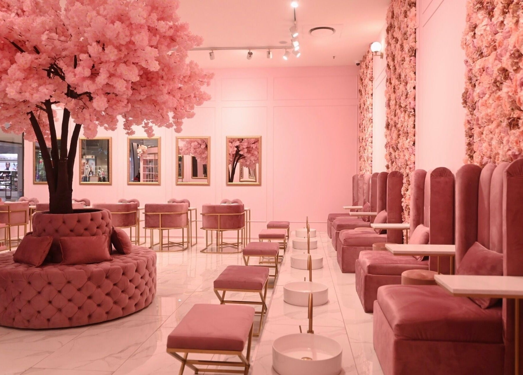 Luxurious pink seating area at BOA Beauty Bar Fourways Mall, Sandton, Gauteng, ZA with floral decor.