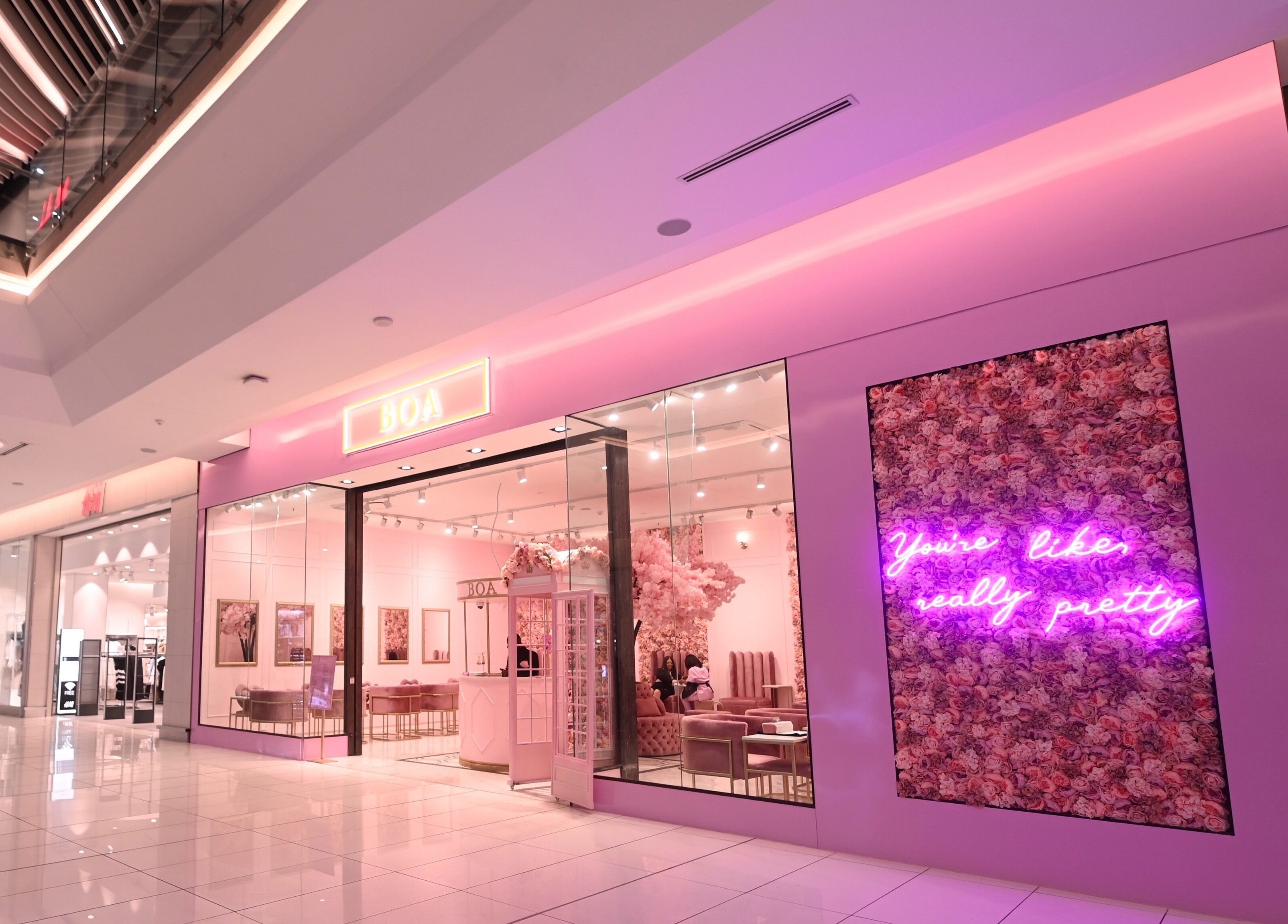 Exterior of BOA Beauty Bar Fourways Mall, Sandton, Gauteng, ZA with pink decor and ambiance.