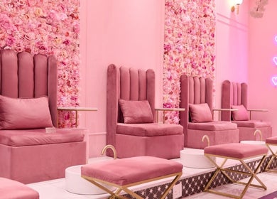 Elegant pink pedicure lounge at BOA Beauty Bar Riverlands Mall in Cape Town, Western Cape, ZA adorned with flowers.
