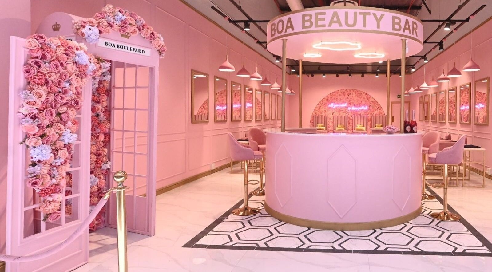 Elegant BOA Beauty Bar Table Bay interior in Cape Town, Western Cape, ZA with pink decor and floral accents.