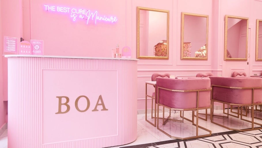 Elegant reception at BOA Beauty Bar Buitengracht Street, Cape Town, Western Cape, ZA in vibrant pink decor.