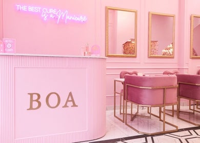 Elegant reception at BOA Beauty Bar Buitengracht Street, Cape Town, Western Cape, ZA in vibrant pink decor.
