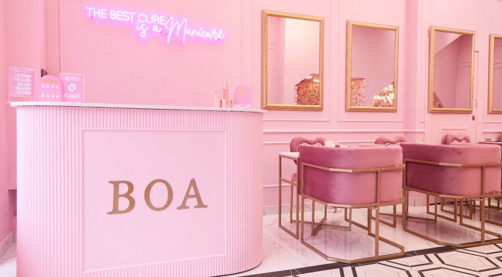 Elegant reception at BOA Beauty Bar Buitengracht Street, Cape Town, Western Cape, ZA in vibrant pink decor.