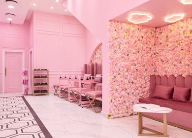 Luxurious pink interior of BOA Beauty Bar Buitengracht Street, Cape Town, Western Cape, ZA with floral wall decor.