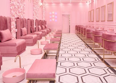 Luxurious pink interior of BOA Beauty Bar Ballito, Kwazulu-natal, ZA showcasing elegant seating and decor.