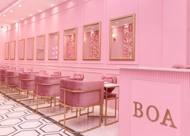 Chic pink interior of BOA Beauty Bar Ballito, Ballito, Kwazulu-natal, ZA. Elegant seating and decor.