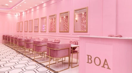 Chic pink interior of BOA Beauty Bar Ballito, Ballito, Kwazulu-natal, ZA. Elegant seating and decor.