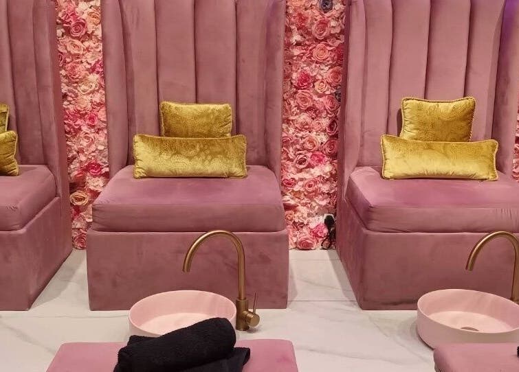 Luxurious pedicure setup at BOA Beauty Bar Mall Of The South, Alberton, Gauteng, ZA with plush pink chairs.