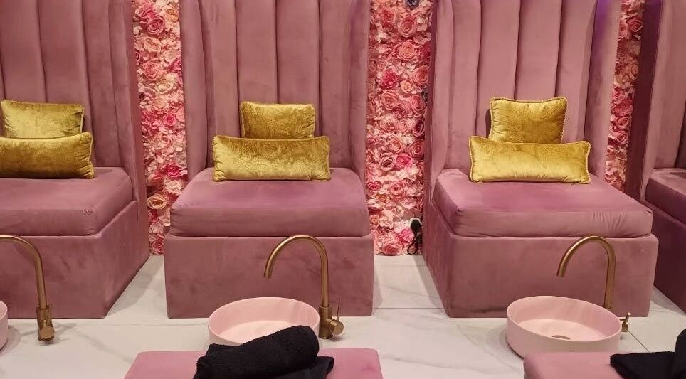 Luxurious pedicure setup at BOA Beauty Bar Mall Of The South, Alberton, Gauteng, ZA with plush pink chairs.