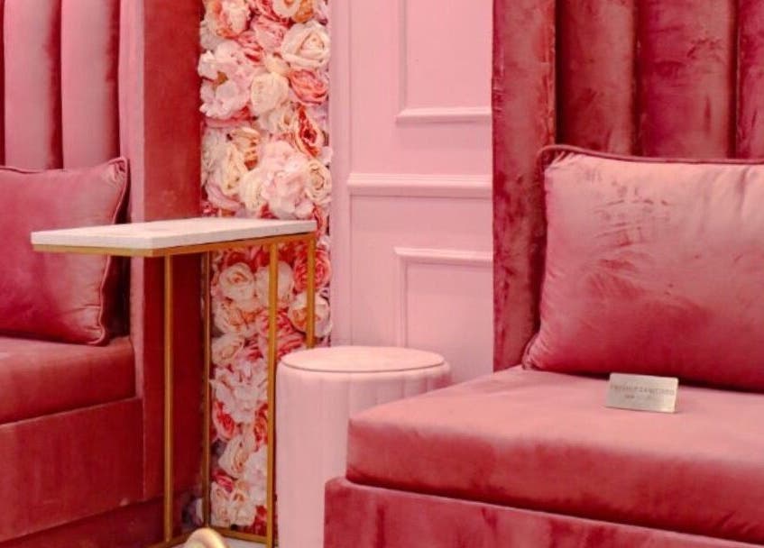 Luxurious pink velvet chairs and floral wall at BOA Beauty Bar Mall Of The South, Alberton, Gauteng, ZA.