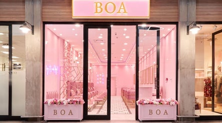 BOA Beauty Bar Sandown entrance, vibrant pink interior in Cape Town, Western Cape, ZA.