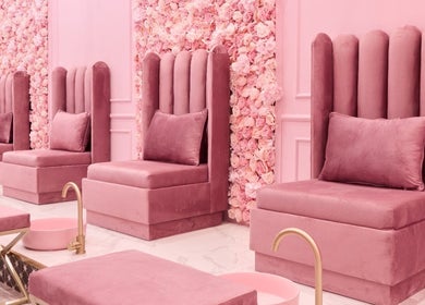 Luxurious pink seating area at BOA Beauty Bar Sandown, Cape Town, Western Cape, ZA with plush furnishings.