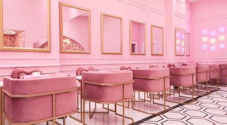 Luxurious pink interiors of BOA Beauty Bar Verdi Shopping Centre in Randburg, Gauteng, ZA with plush seating.