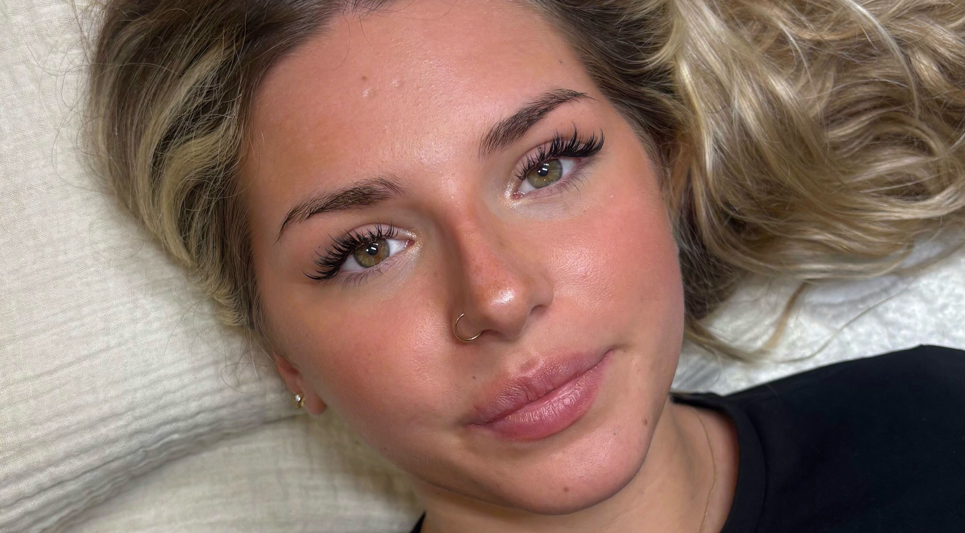 Close-up of a woman with enhanced eyelashes at H L Beauty, Leeds, England, GB.