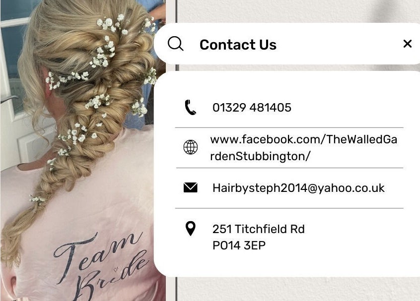 Intricate bridal hairstyle with flowers at The Walled Garden Salon in Fareham, England, GB.