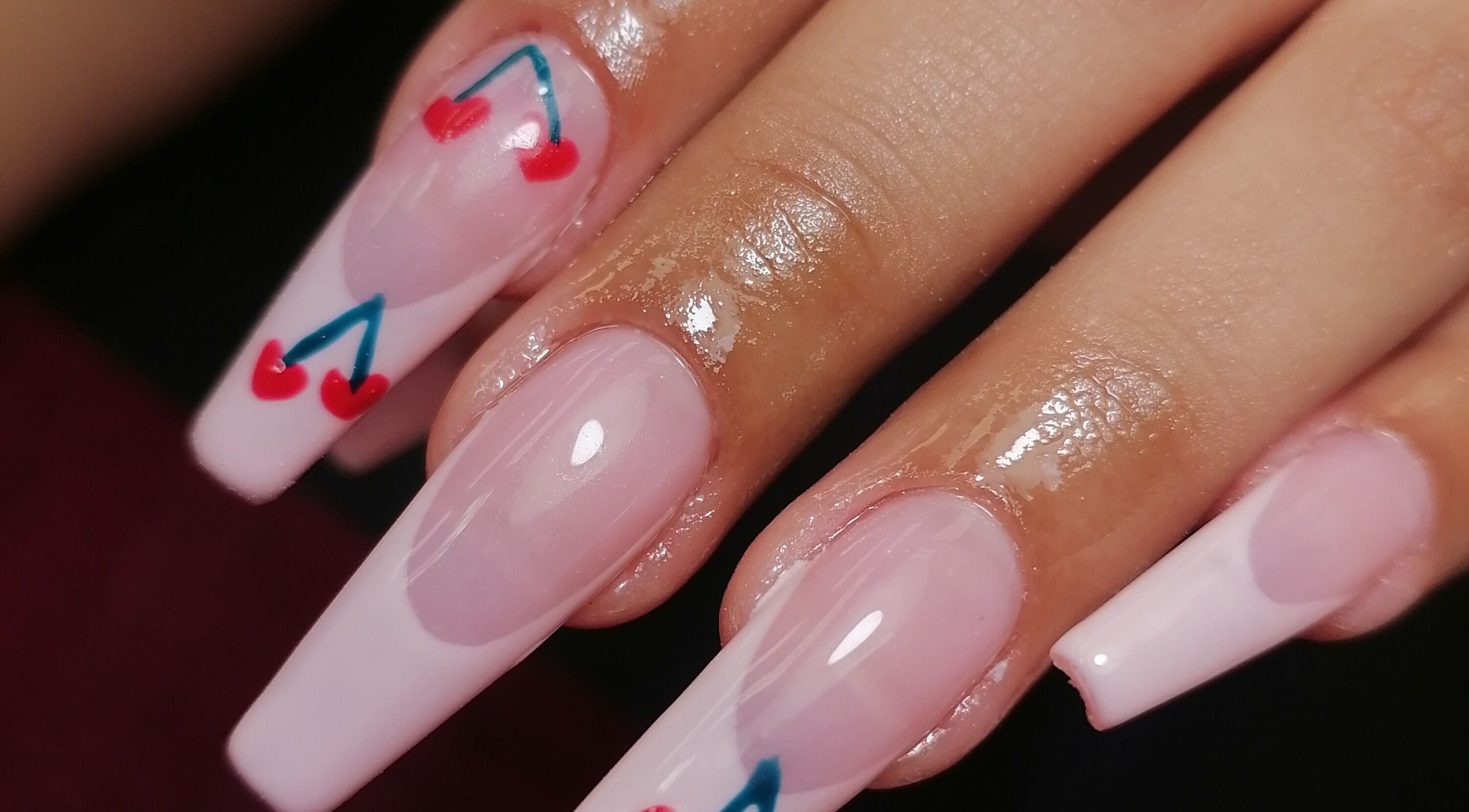 Cherry-accented pink nails at Majestic Beauty Co, Cape Town, Western Cape, ZA for a stylish look.