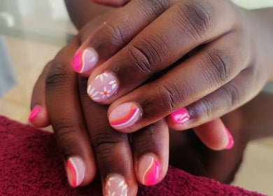 Colorful nail art at Majestic Beauty Co, Cape Town, Western Cape, ZA, showcasing intricate designs.