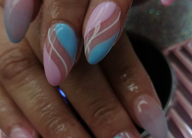 Stylish nail art in pastel pink and blue swirls at Majestic Beauty Co, Cape Town, Western Cape, ZA.